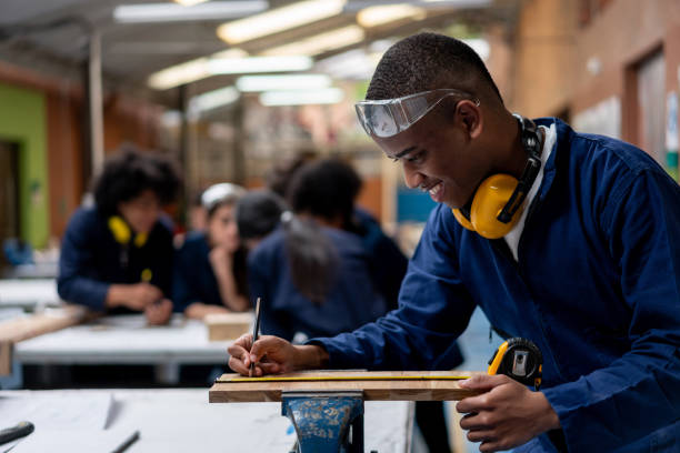 istock Industrial design student building furniture at a workshop in class 1204089510