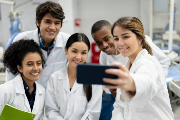 istock Group of medical students taking a selfie in class 1204089532