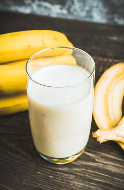 istock Banana milkshake with on the rustic background 1204090637