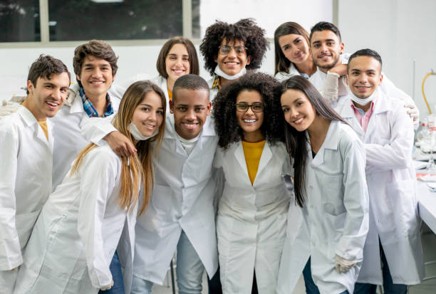 istock Happy group of STEM students at the lab 1204093293
