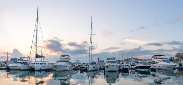 istock Beautiful sunset in the sea harbor with moored yachts. 1204096123