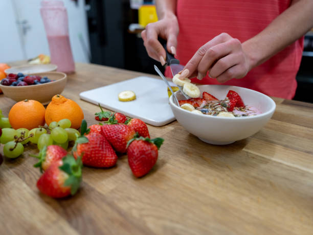istock Close-up on a woman at home making a parfait 1204096243