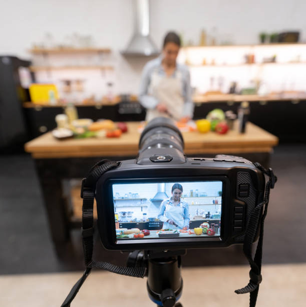 istock Blogger recording a cooking video at home 1204096269