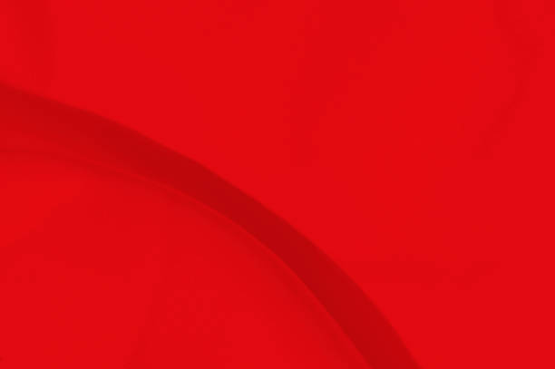 istock Red fabric sheets background or texture, abstract with waves, Soft focus cloth silk Red 1204097683