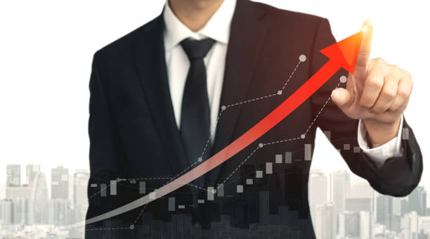 istock Double Exposure Image of Business Profit Growth 1204099546