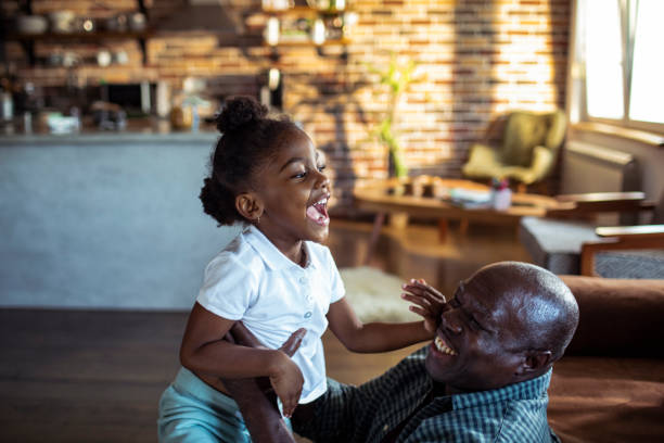istock Grandfather and Granddaughter 1204101289