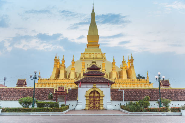 istock Reclining Buddha Statue at Wat Pha That Luang, Vientiane, Laos 1204101376