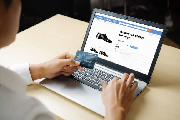 istock Young man use credit card for online shopping 1204101627