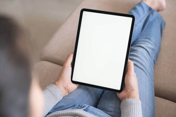 istock Blank digital tablet in the hand of Asian women, Tablet computer white screen 1204106051