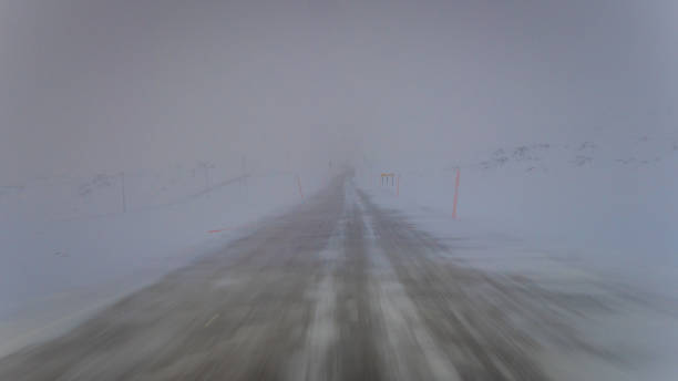 istock Blizzard on a two-lane road in arctic Norway 1204107903