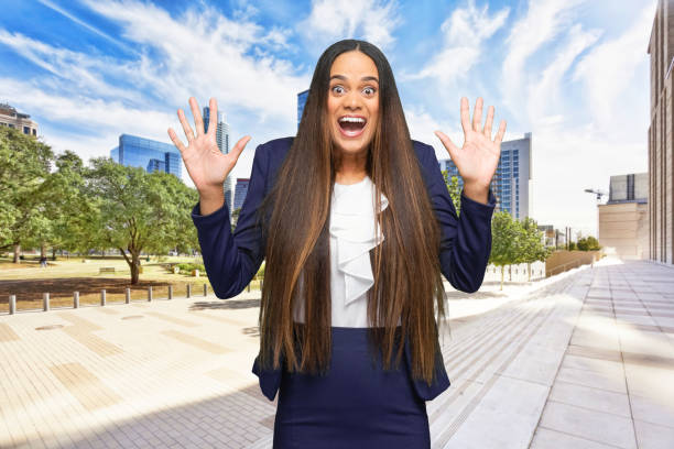 african-american ethnicity young women manager standing who is outdoors wearing blazer - thank you excitement waist up horizontal imagens e fotografias de stock