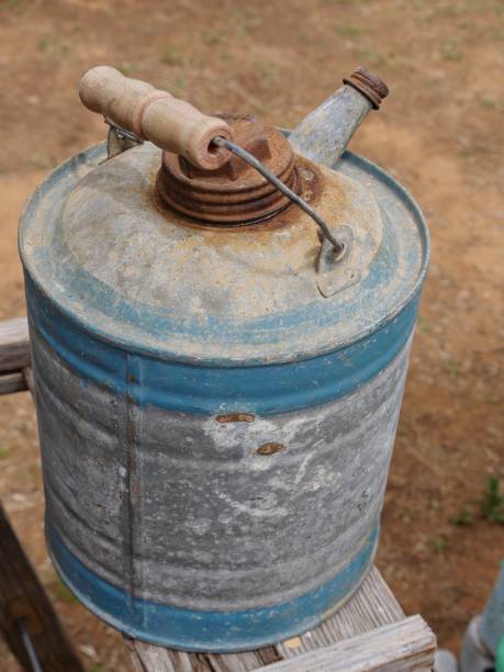 istock Old rusty watering can sold at a flea market 1204112687