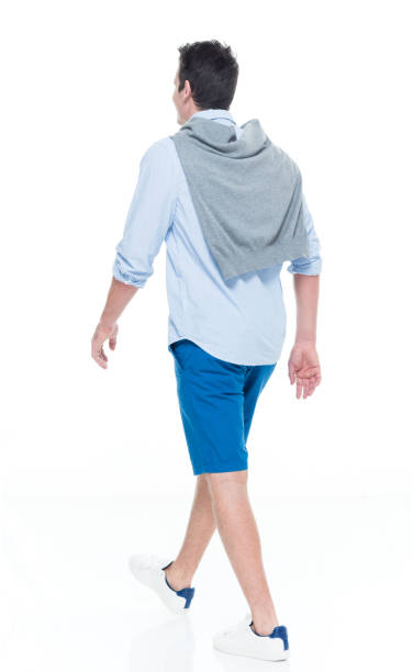 istock Caucasian male walking wearing sweater 1204115421