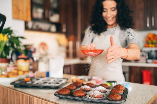 Confectioner decorating Chocolate Muffins