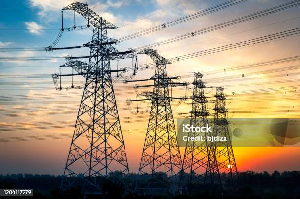 Highvoltage Wire Tower At Dusk Stock Photo - Download Image Now - Power Line, Electricity, Power Cable