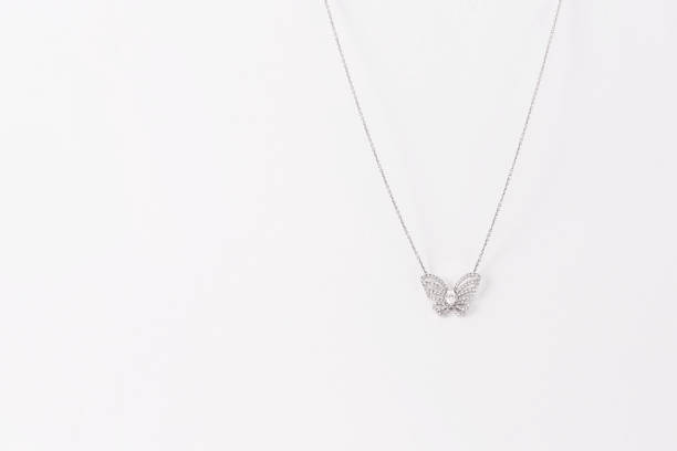 istock Luxury white golden pendant with diamonds with free space for text 1204117512