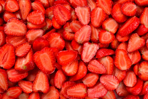 istock Strawberry slices. Fresh berries macro. Fruit background. Top view. 1204119242