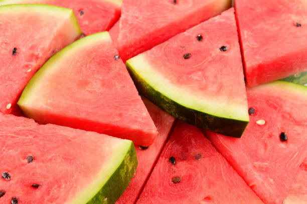 istock Juicy watermelon slices background. Top view. 1204119443