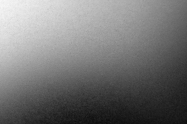 istock Ground glass texture with light with blur effect in black and white. 1204120599