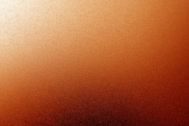 istock Ground glass texture with light with blur effect in orange tone. 1204121344