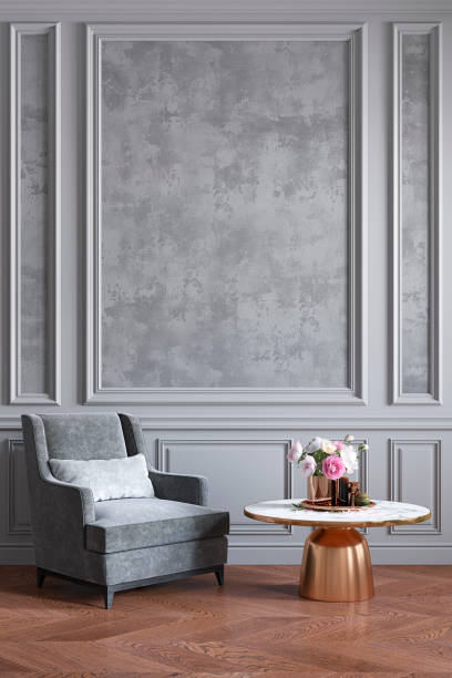 istock Classic gray interior with gray armchair, coffee table, flowers and wall moldings. 3d render illustration mockup. 1204125502