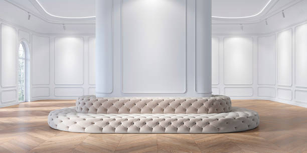 istock Exhibition hall, museum, showroom classic white interior with capitone upholstery sofa, molding, wall panel, wood floor. 3d render illustration mock up. 1204125525