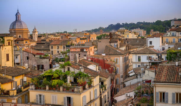 a suggestive scene among the roofs and domes of the historic center of rome seen from a terrace in campo de fiori - rome cityscape aerial view city imagens e fotografias de stock