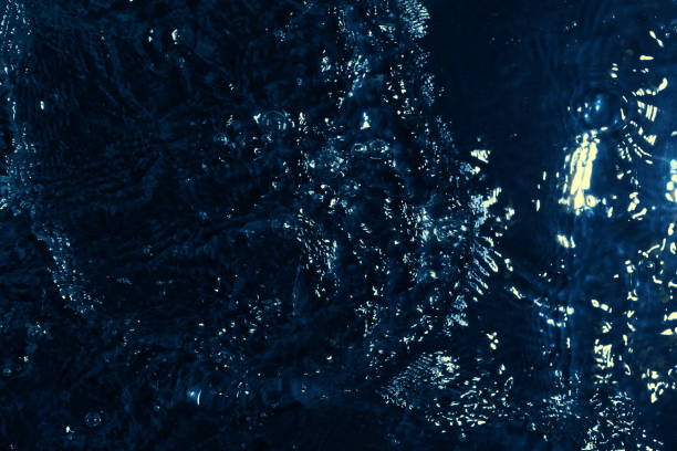 istock texture of water on black background, Water in night time 1204127678