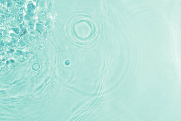 istock texture of splashing clean water on turquoise background 1204128027