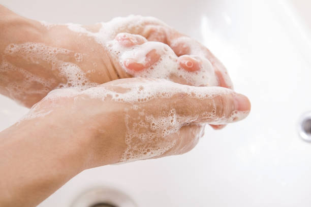 istock Washing Hands with soap in bathroom. Hygiene 1204129736