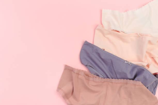 istock Female panties over pink  background 1204130138