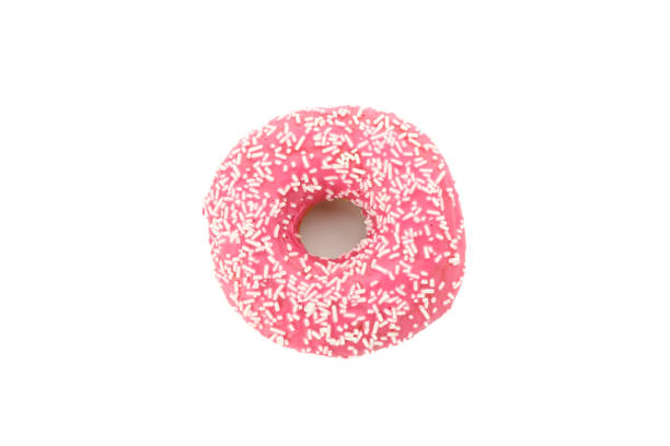 istock Tasty pink donut isolated on white background 1204135379
