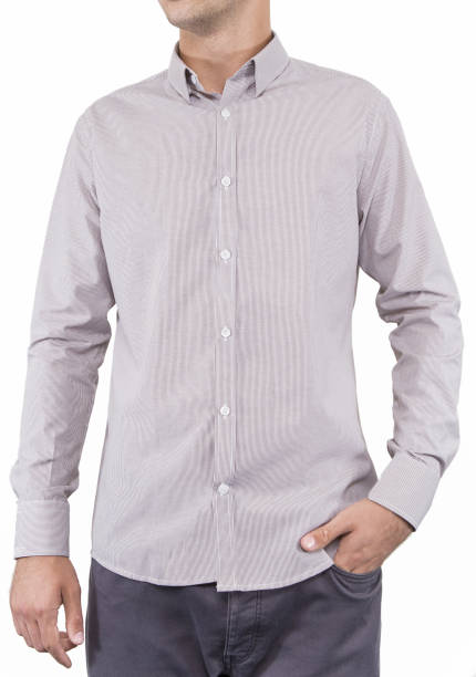 istock Handsome and confident young man wearing shirt while standing on white background. 1204135815