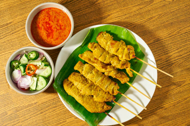 タイ料理のポークサタイ - banana leaf food thailand thai culture ストックフォトと画像