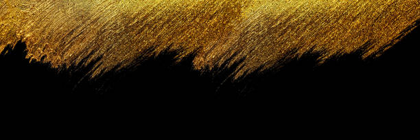 istock Golden drop of paint on a white paper background. 1204143448