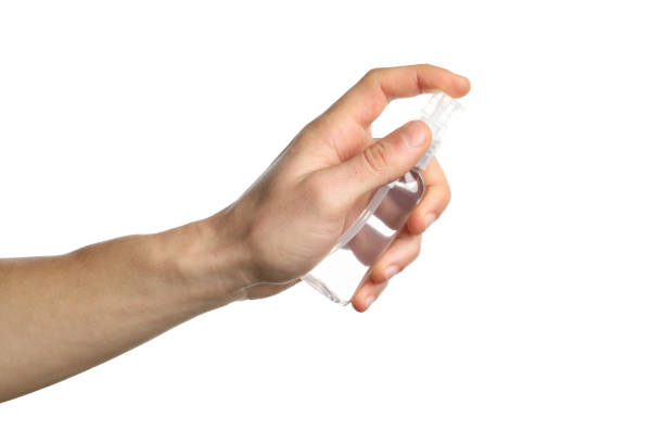 istock Hand holding antiseptic antibacterial disinfectant isolated on white background. Coronavirus protection 1204144001