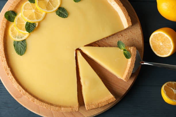 istock Composition with lemon tart on wooden background, top view 1204146926