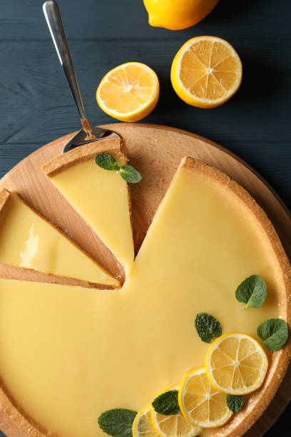 istock Composition with lemon tart on wooden background, top view 1204147957