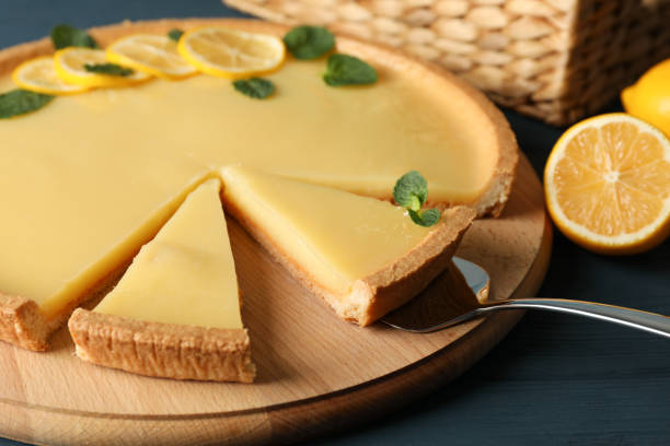 istock Composition with lemon tart on wooden background, close up 1204148828