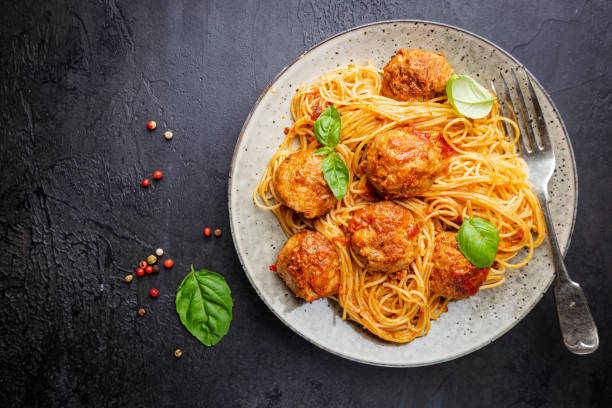 istock Plate of spaghetti with meatballs 1204149539