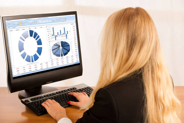 istock Beautiful young blonde woman working on computer in her office 1204155587