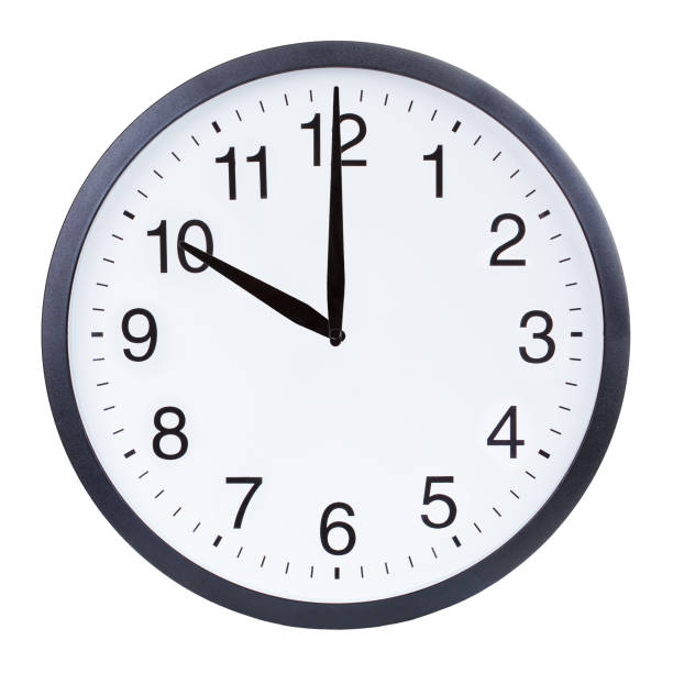istock Round office clock showing ten o'clock isolated on white background 1204156130