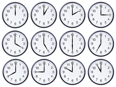 Set of office clocks showing different time isolated on white background