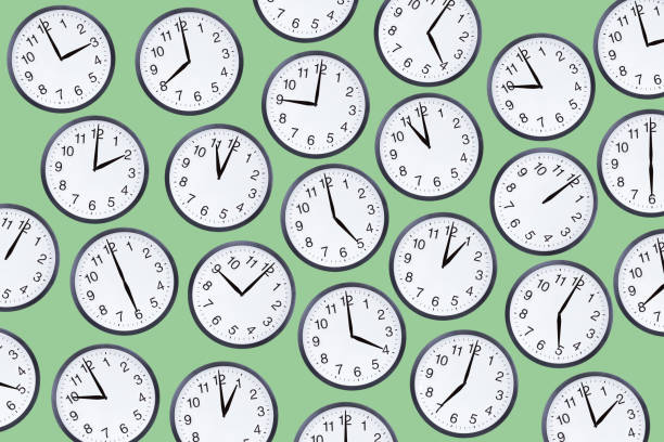 istock Set of office clocks on green background 1204156136