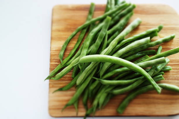 istock freshness green bean on wooden plate 1204157431