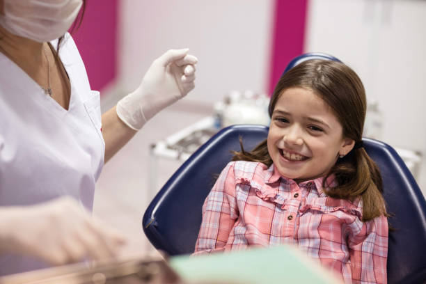 istock Child at dental appointment 1204159281