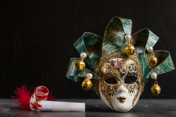 istock venetian carnival mask and matasuegras 1204159401