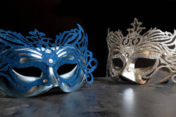 istock blue and silvery carnival masks 1204159416