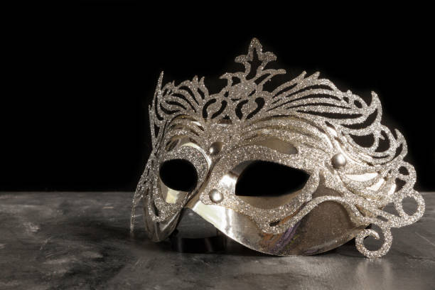istock silvery carnival mask on dark 1204159422