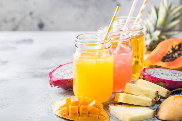 istock Glasses of tropical juices 1204161784